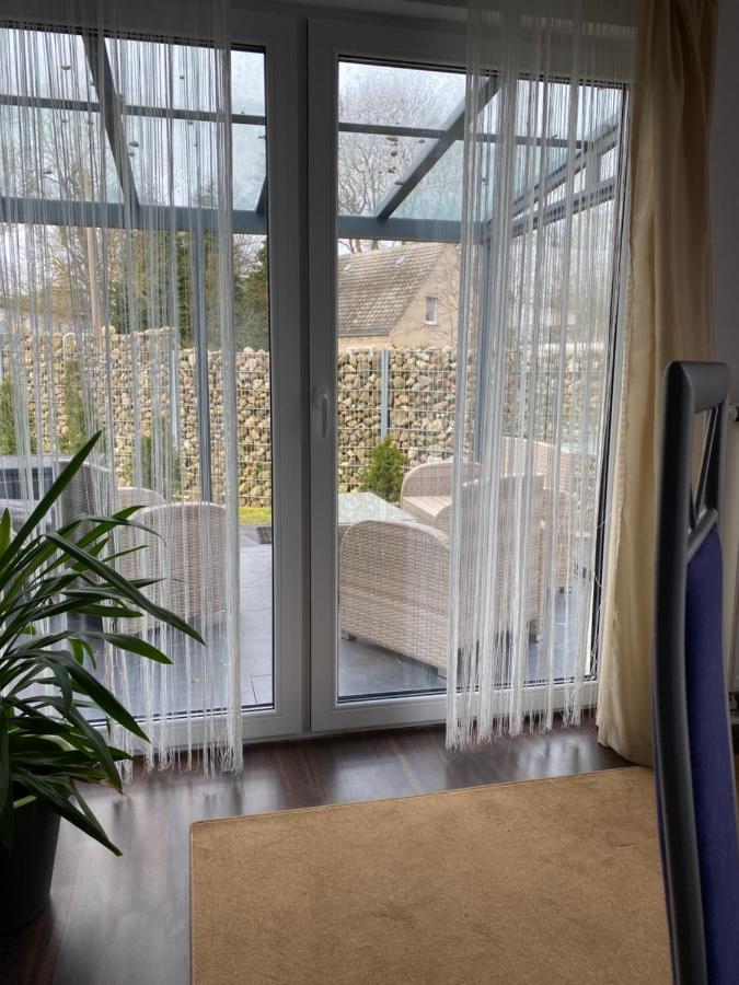 Hafenmeister Ferienwohnung วีคเอาฟ์รือเกน ภายนอก รูปภาพ